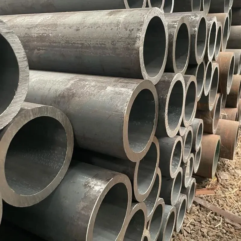 Carbon Steel Seamless Pipes stacked in warehouse for pressure and industrial piping applications